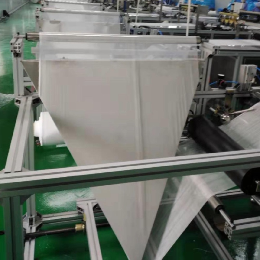 全自動二折腹部墊折疊機